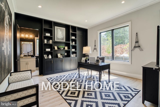 office area featuring light wood-style flooring, baseboards, crown molding, and recessed lighting