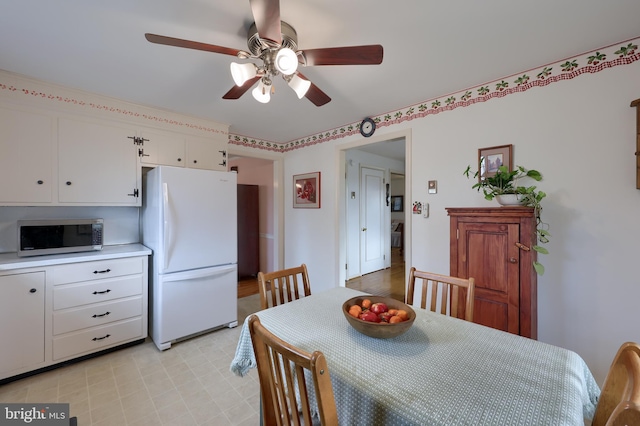 dining area featuring ceiling fan