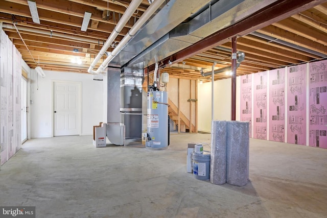 unfinished below grade area with heating unit and water heater