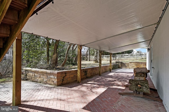 view of patio with fence