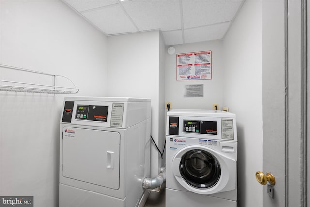 community laundry room with separate washer and dryer