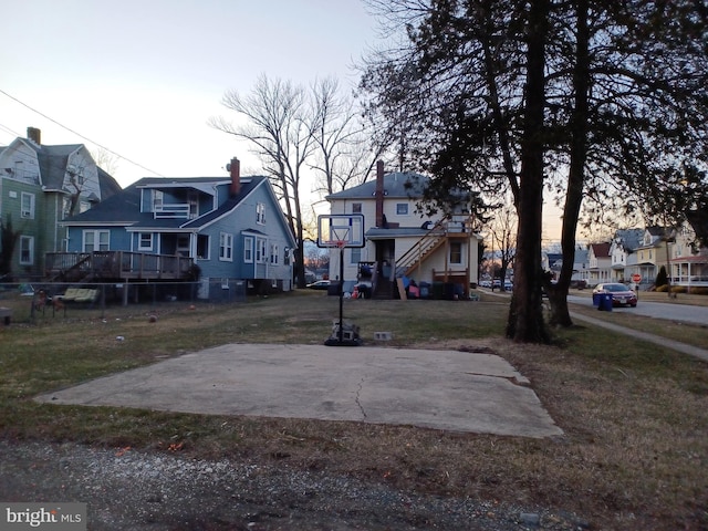 view of yard featuring a residential view and fence