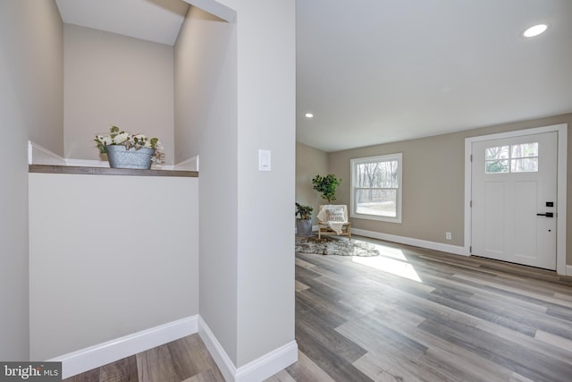 foyer entrance featuring recessed lighting, baseboards, and wood finished floors