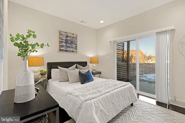 bedroom featuring access to exterior, recessed lighting, visible vents, and wood finished floors