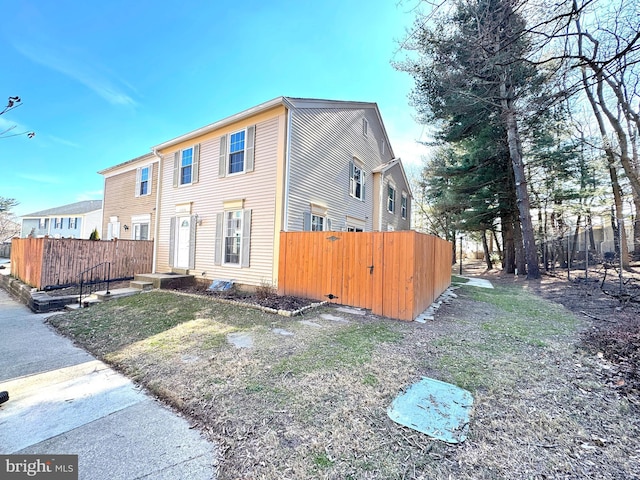 view of front of property with fence