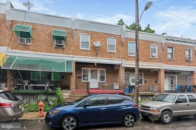 multi unit property featuring brick siding