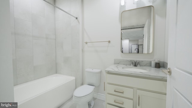 bathroom with toilet, shower / bathing tub combination, and vanity