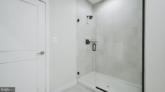 full bathroom featuring a shower stall