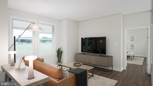 living area with baseboards and dark wood finished floors