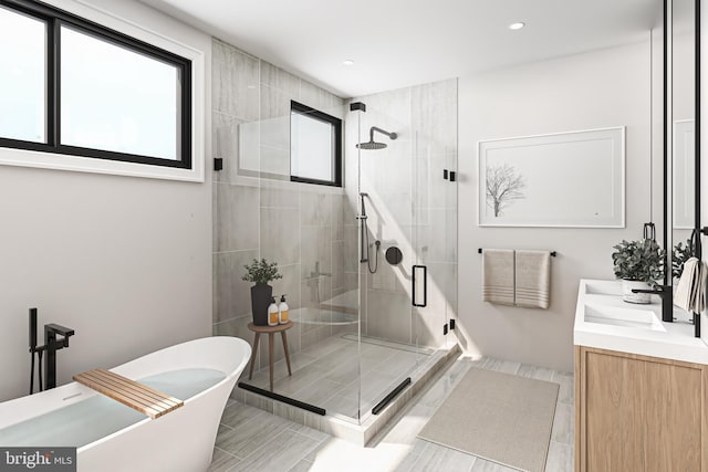 168 W Berks St, Philadelphia, PA 19122 - full bath featuring a sink, double vanity, a soaking tub, and a shower stall