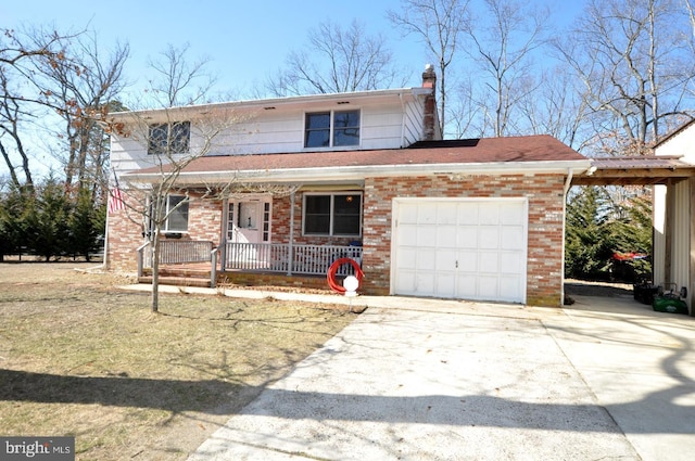 view of front of property with concrete driveway, a chimney, an attached garage, covered porch, and brick siding