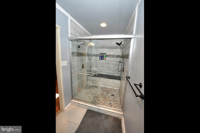 bathroom with a stall shower