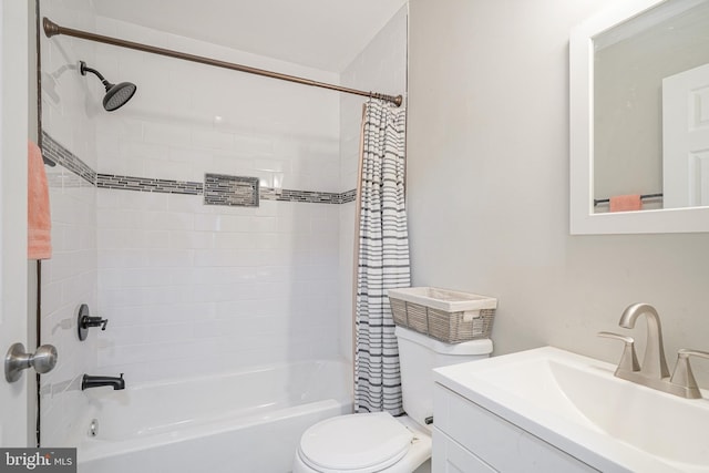 full bathroom featuring toilet, shower / bath combination with curtain, and vanity