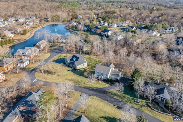 aerial view with a water view and a residential view