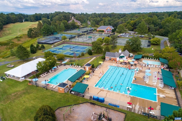 aerial view featuring a view of trees