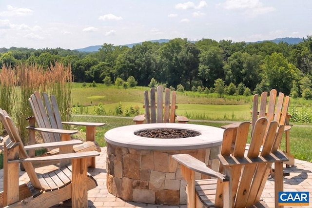 view of patio with a view of trees