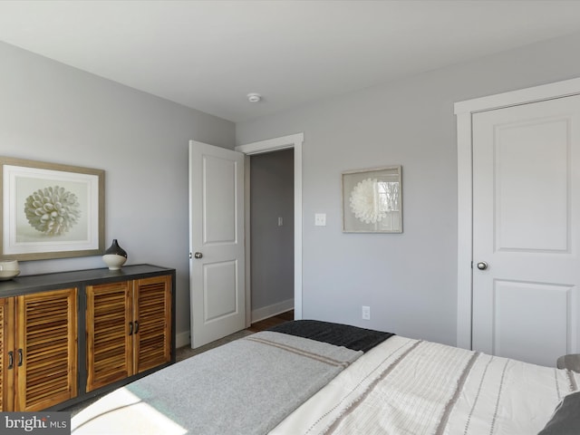 bedroom featuring baseboards