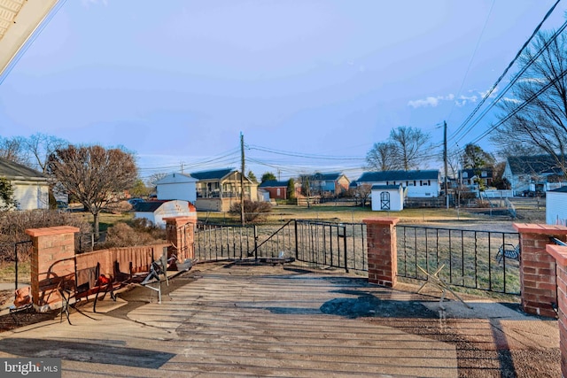 wooden deck featuring fence