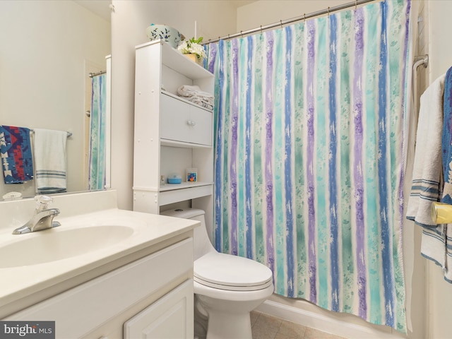 bathroom with tile patterned flooring, vanity, toilet, and a shower with curtain