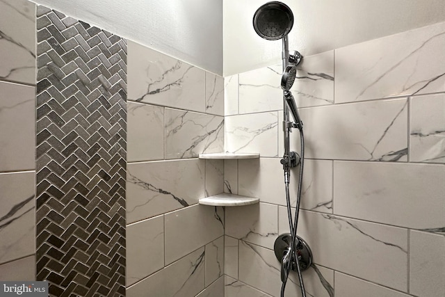 interior space with a tile shower