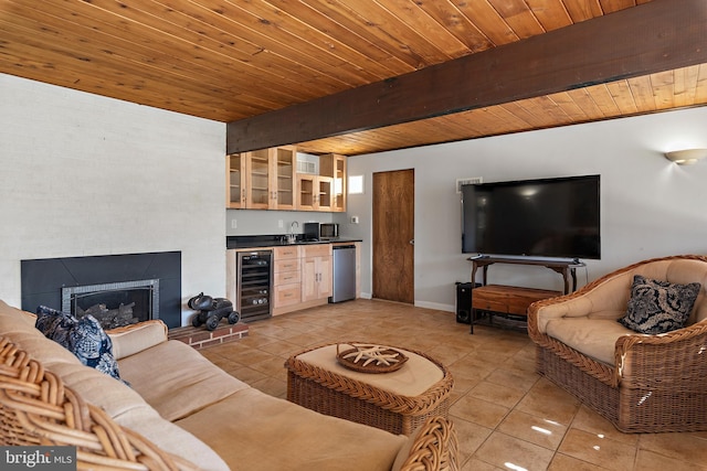 living room with wine cooler, wooden ceiling, wet bar, and light tile patterned flooring