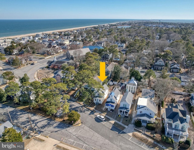 aerial view featuring a residential view and a water view