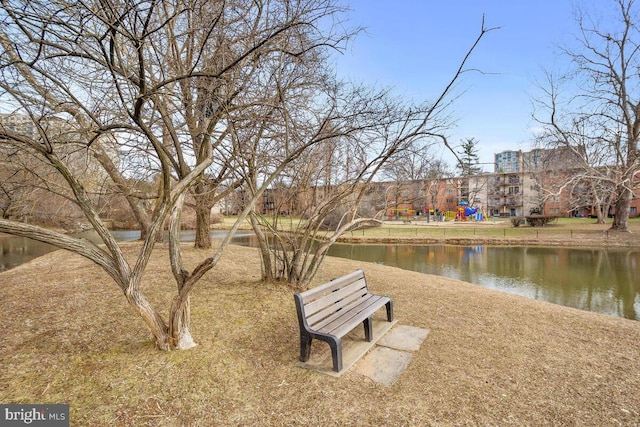 view of community with a water view