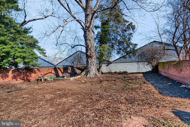 view of yard featuring fence