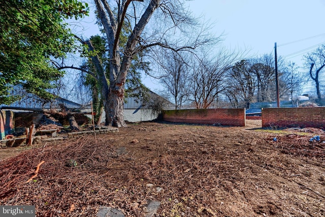 view of yard featuring fence