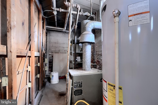 utility room featuring gas water heater