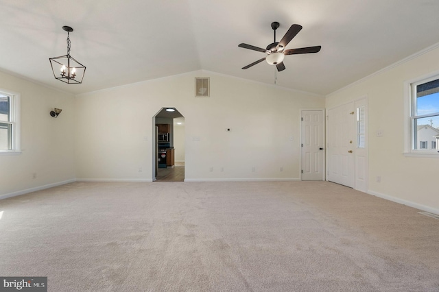 interior space featuring baseboards, crown molding, visible vents, and carpet flooring