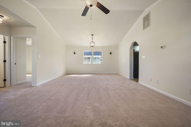 unfurnished room with light carpet, visible vents, and ornamental molding