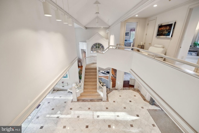 7707 Carlton Pl, Mclean, VA 22102 - stairway featuring ornamental molding, baseboards, lofted ceiling, and recessed lighting