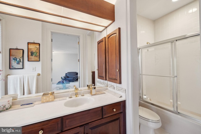 7707 Carlton Pl, Mclean, VA 22102 - bathroom with bath / shower combo with glass door, toilet, and vanity
