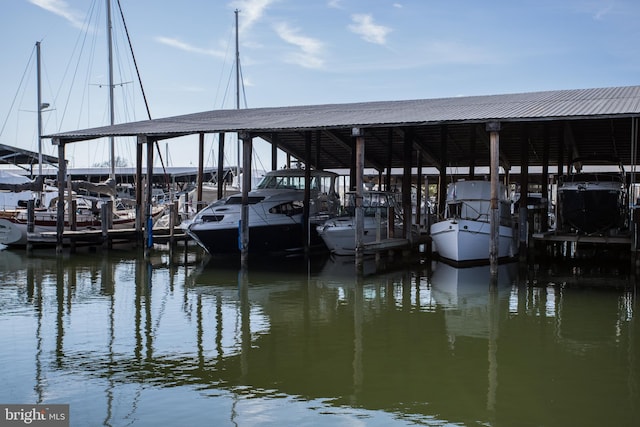 view of dock with a water view and boat lift