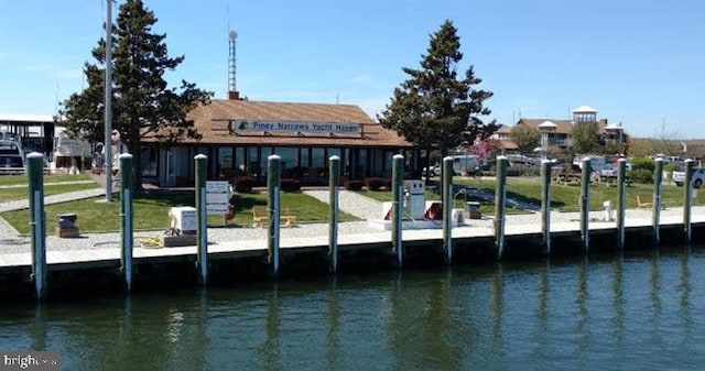 dock area featuring a water view