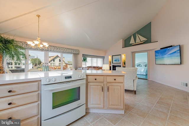 kitchen with visible vents, lofted ceiling, light countertops, white electric range, and a notable chandelier