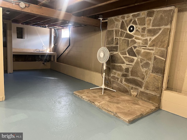 basement with a sink