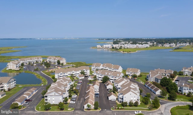 bird's eye view featuring a residential view and a water view