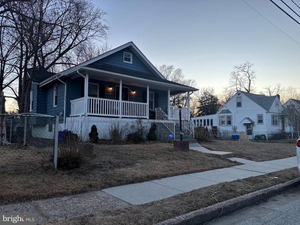 view of front of home featuring covered porch