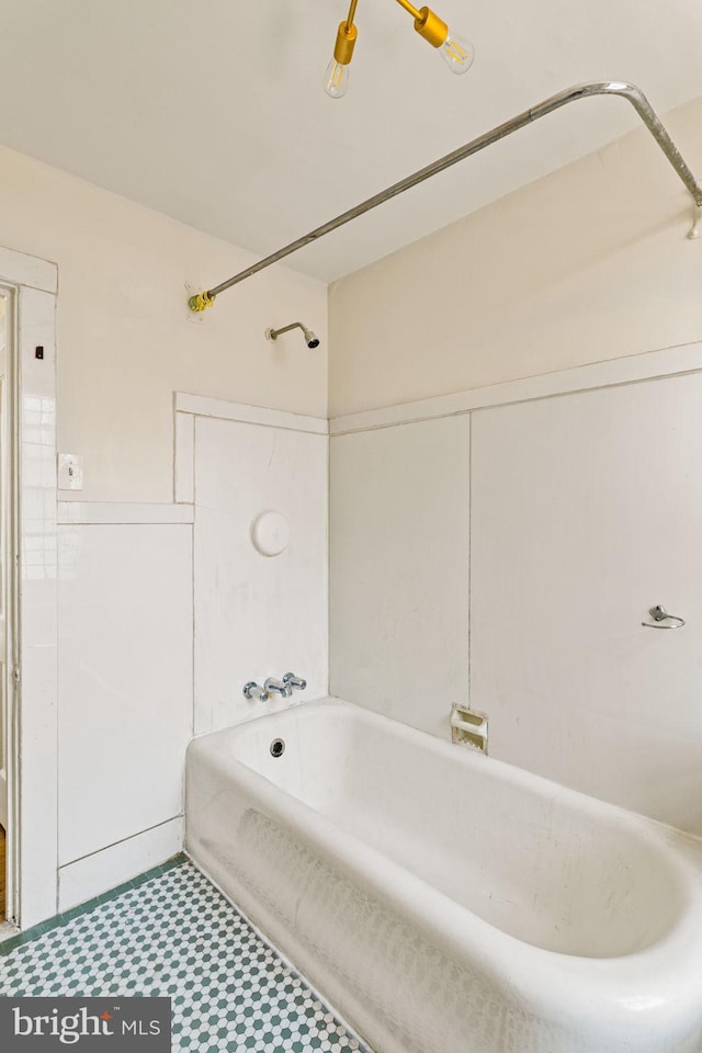 full bathroom featuring shower / bathing tub combination and tile patterned floors