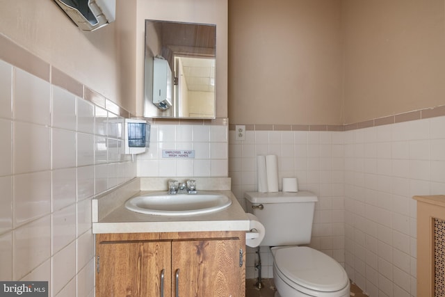 709 E Passyunk Ave, Philadelphia, PA 19147 - half bath featuring toilet, vanity, and tile walls