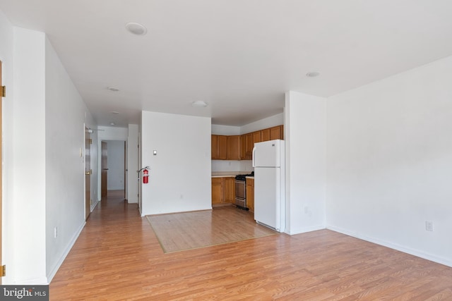 709 E Passyunk Ave, Philadelphia, PA 19147 - unfurnished living room with light wood finished floors and baseboards