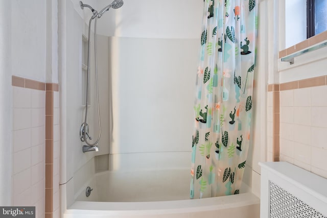 709 E Passyunk Ave, Philadelphia, PA 19147 - full bath with tile walls, shower / bathtub combination with curtain, and radiator heating unit