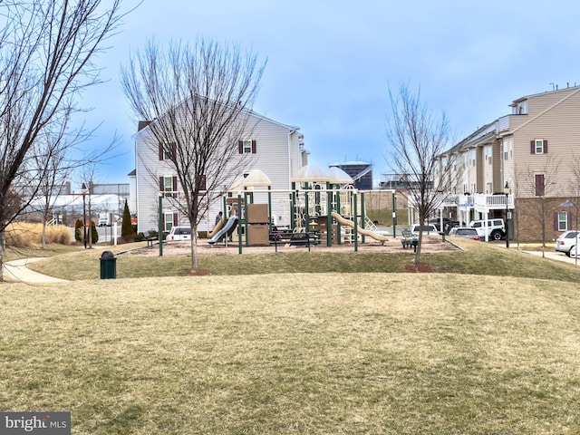 community playground featuring a yard