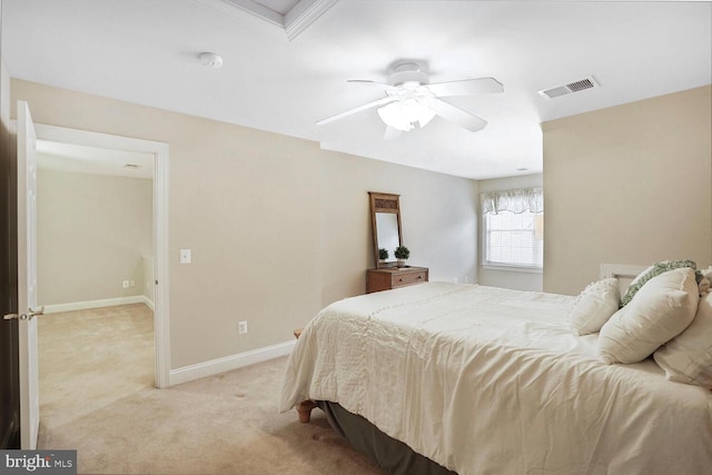 bedroom featuring a ceiling fan, light carpet, visible vents, and baseboards