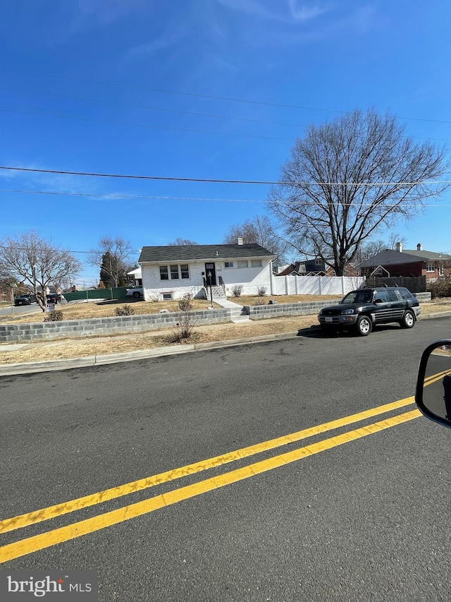 view of front of property with fence