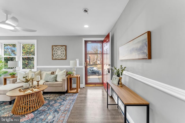 living area with ceiling fan, wood finished floors, and recessed lighting