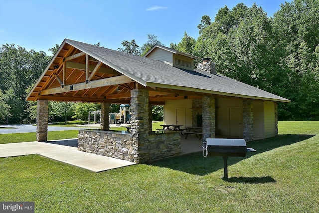 view of home's community with a gazebo and a lawn