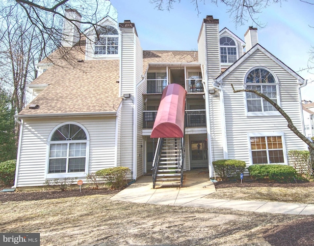 view of building exterior featuring stairway